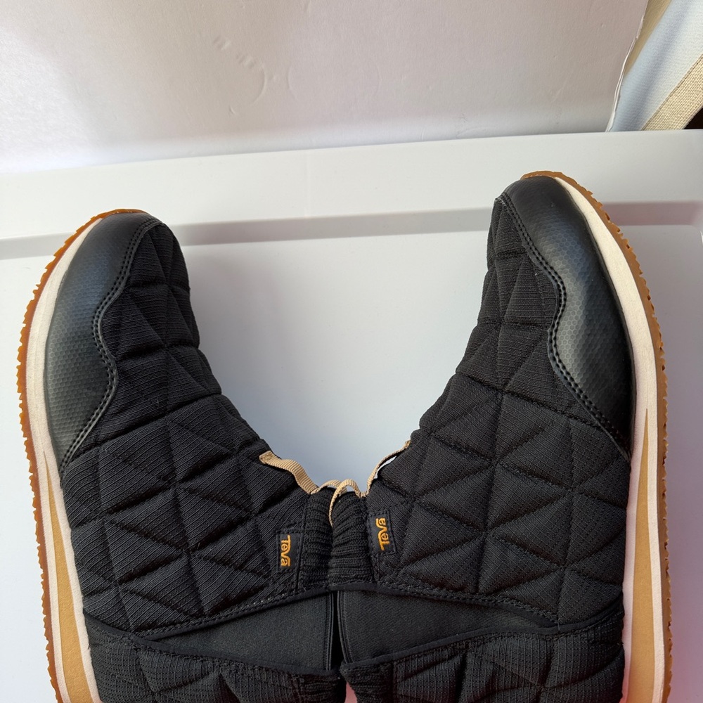 Teva Woman’s Black Quilted Slip-On Winter Boots with Tan Trim